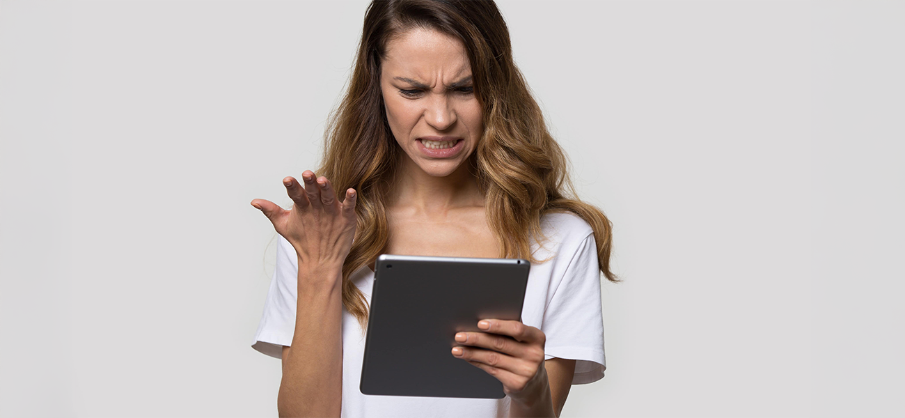 A woman angry at a broken iPad.