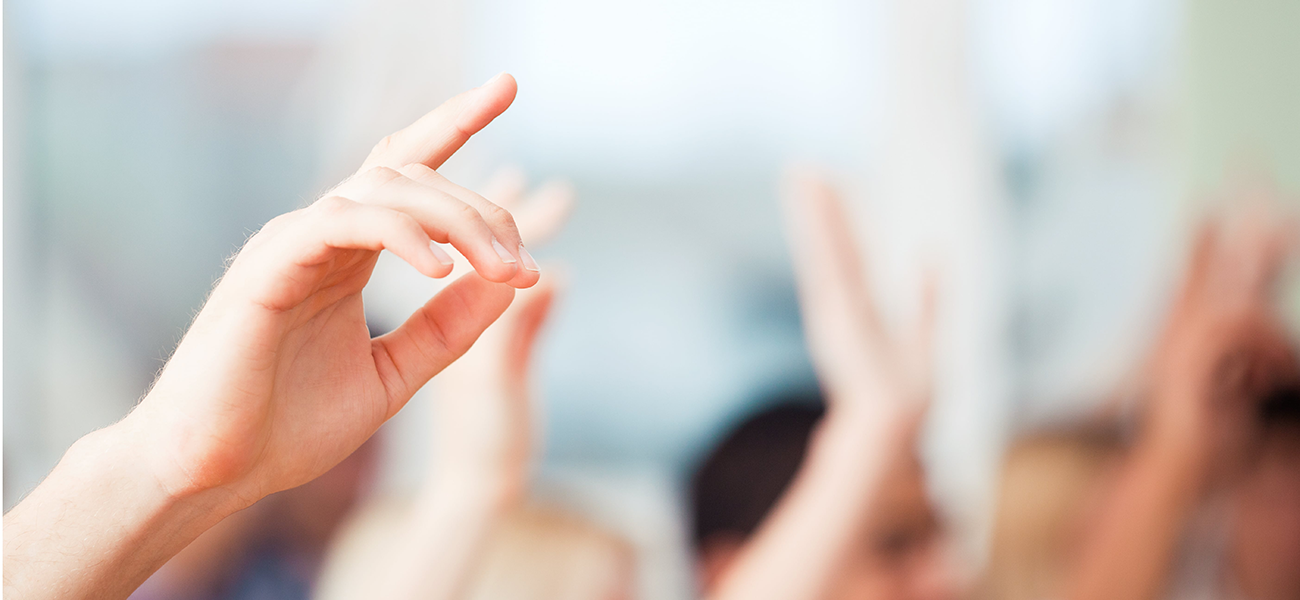 Hands up waiting to ask questions.
