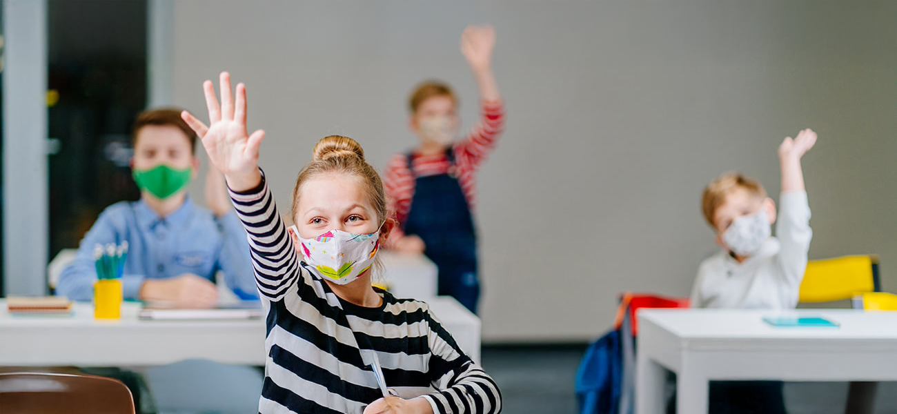 Students in class wearing masks.